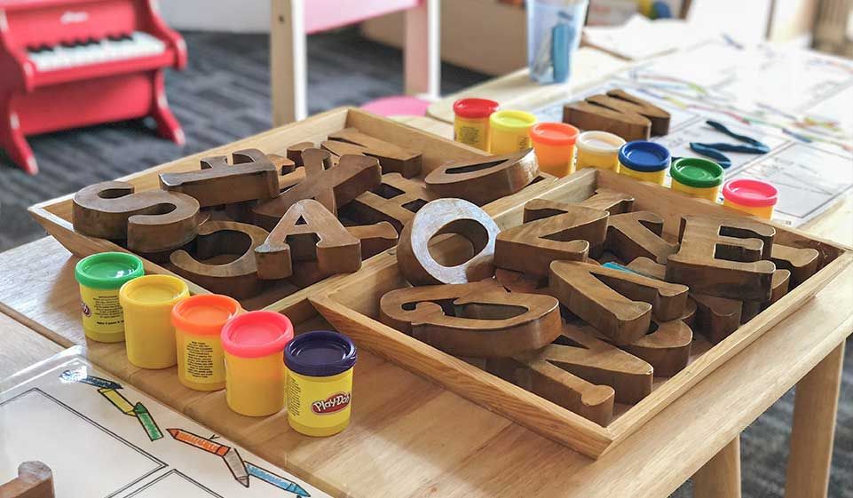  Letter blocks scattered on the table